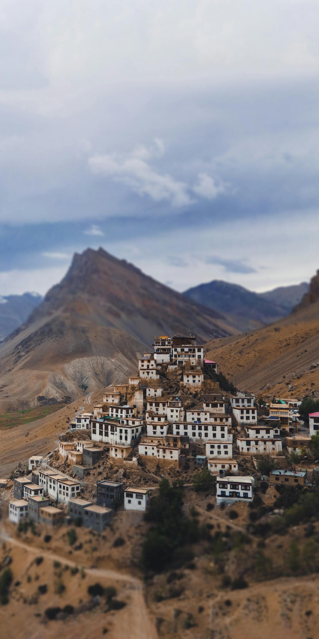 Aerial view of the Key Monastery nestled in the rugged Spiti Valley, Himachal Pradesh, India.